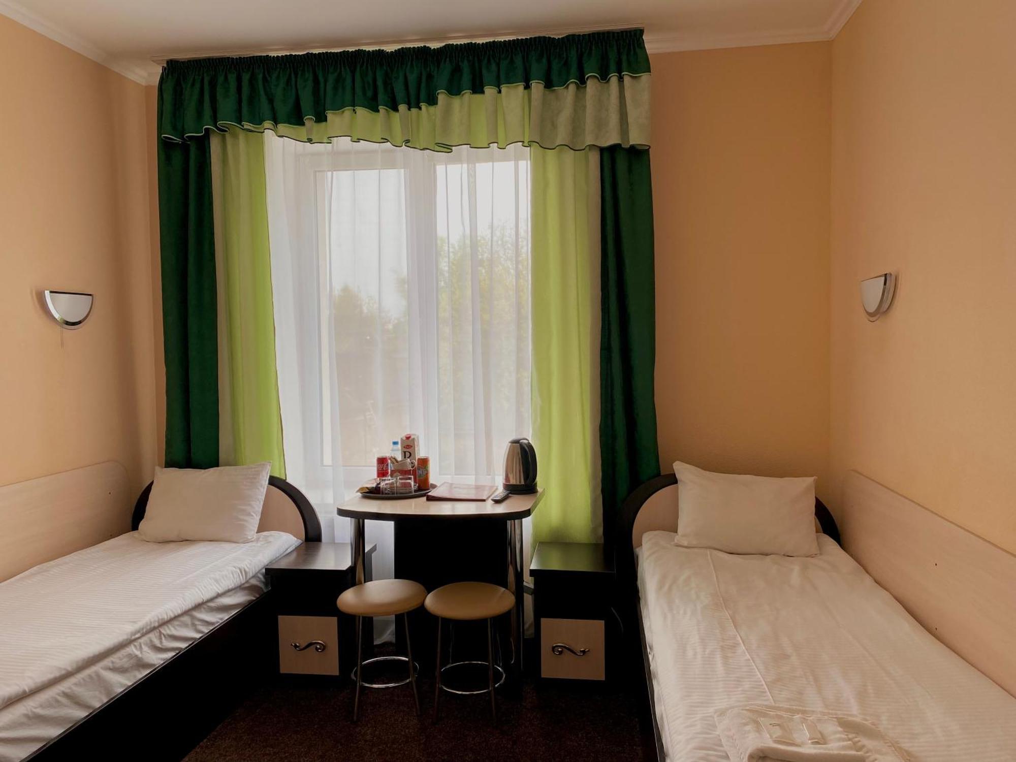 Орхідея Hotel Romny Bagian luar foto