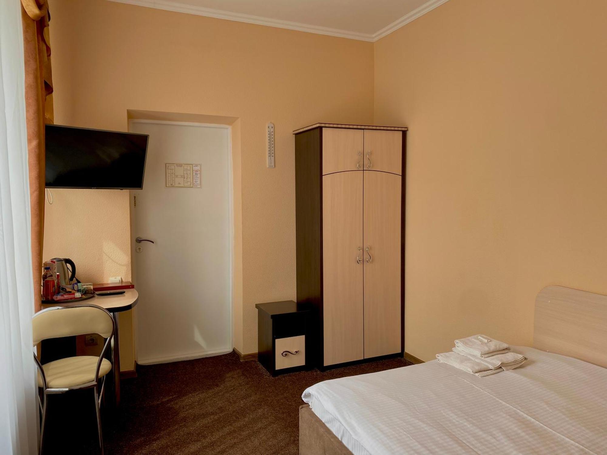 Орхідея Hotel Romny Bagian luar foto