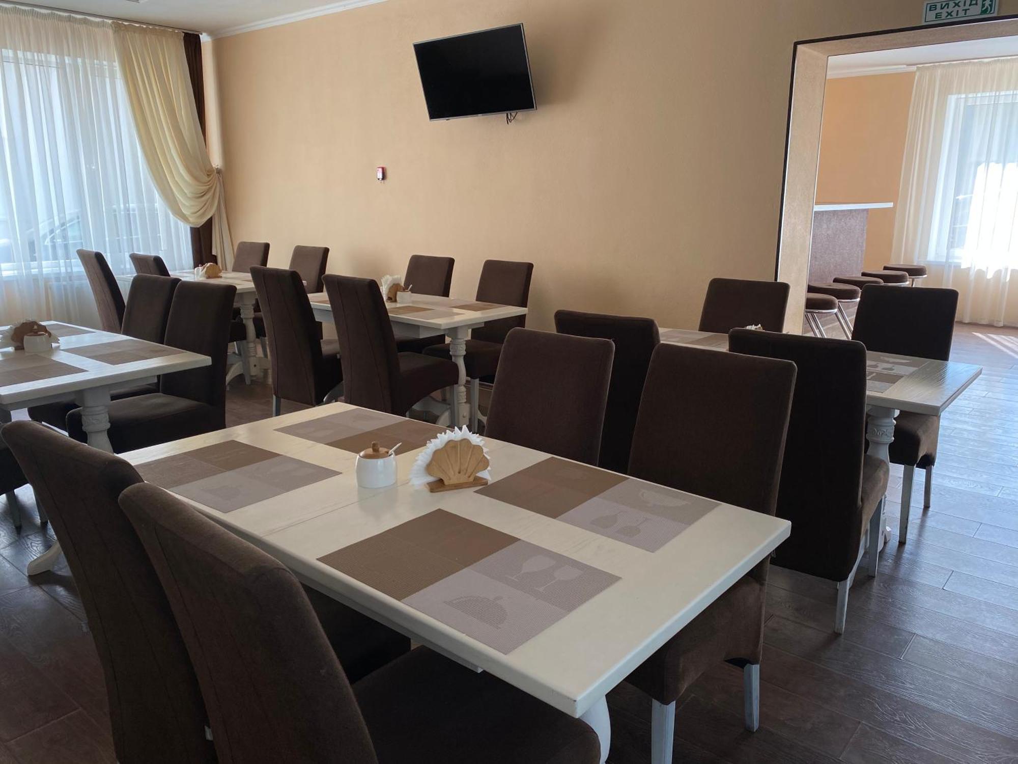Орхідея Hotel Romny Bagian luar foto