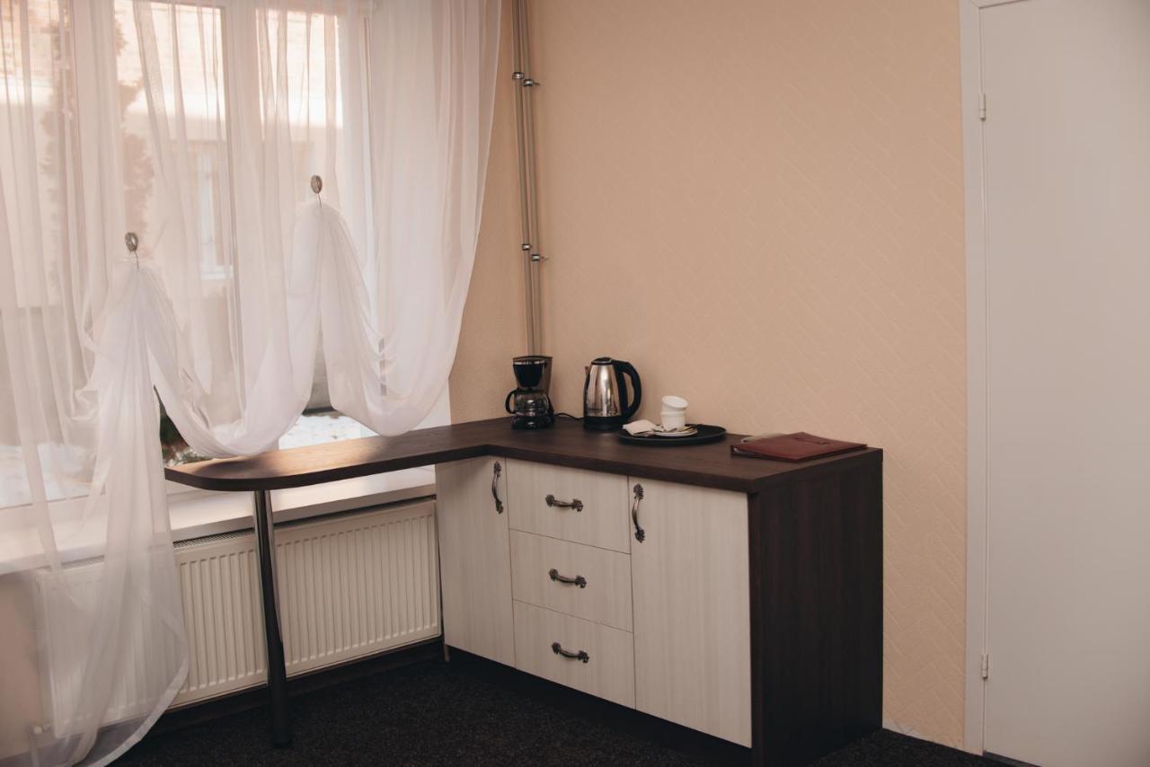 Орхідея Hotel Romny Bagian luar foto