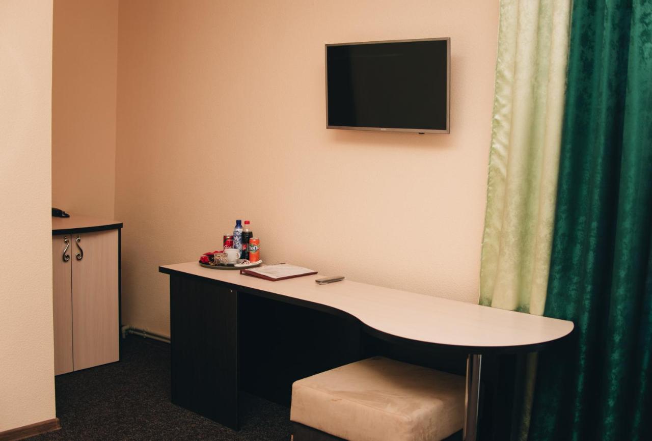 Орхідея Hotel Romny Bagian luar foto