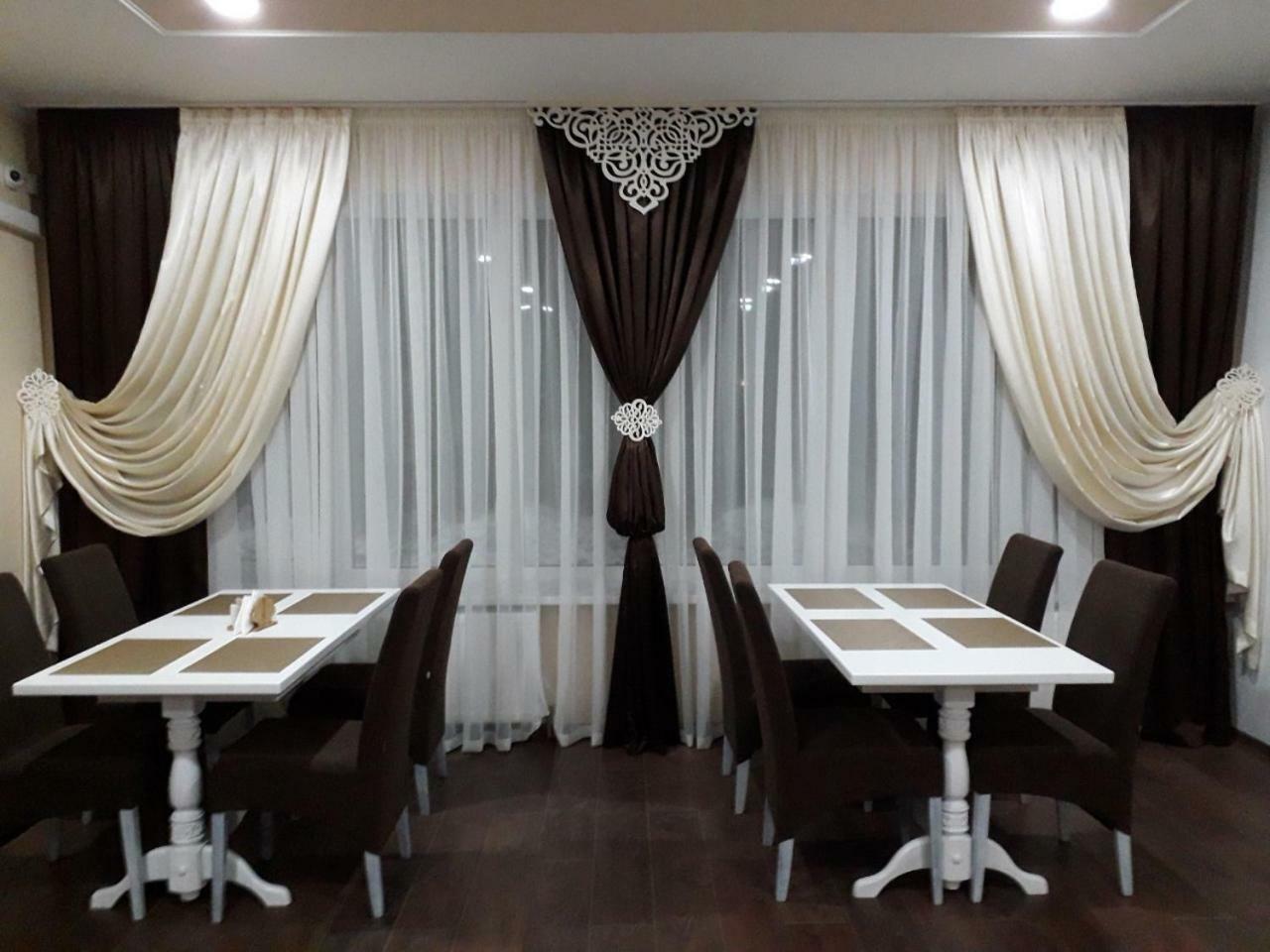 Орхідея Hotel Romny Bagian luar foto